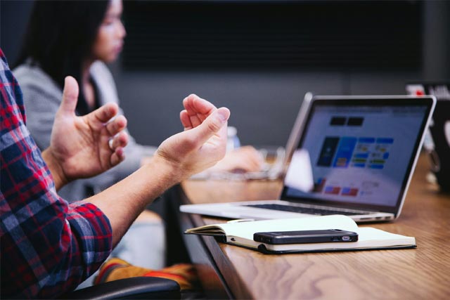 Man explaining in conference room