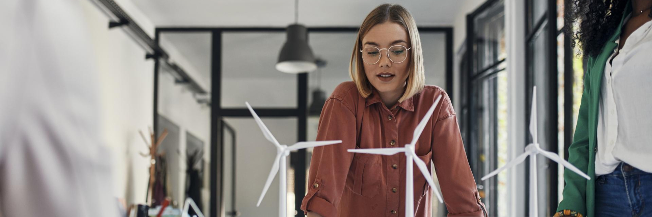 woman looking at display in office setting