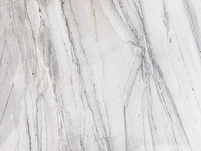 Lastra di marmo bianco con venature nere e dorate