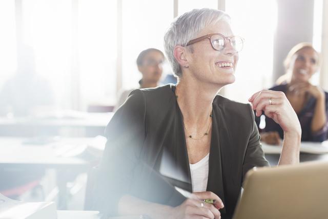 Mensen in een training van Allianz Trade