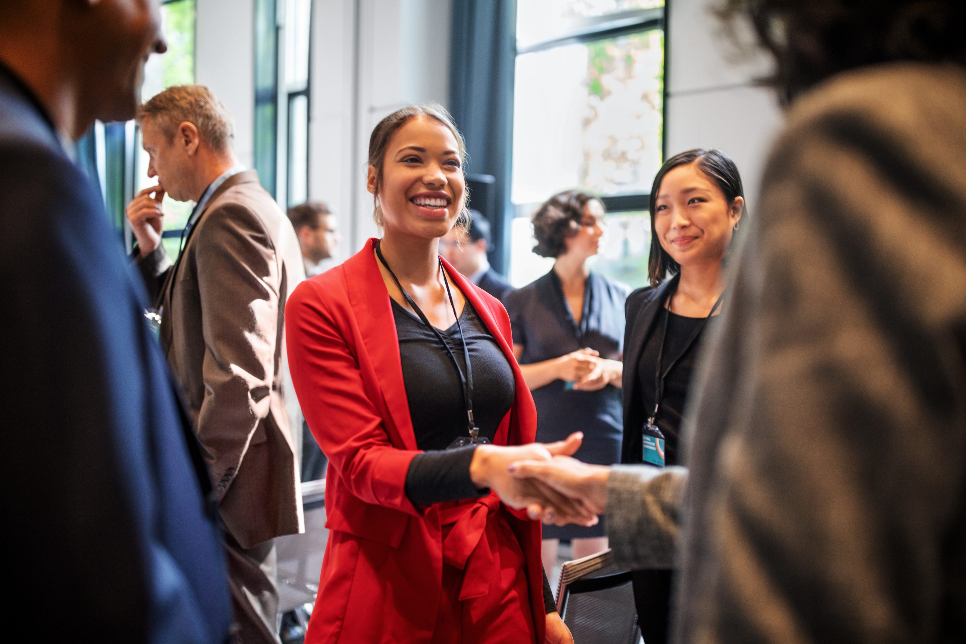 professional handshaking at an event