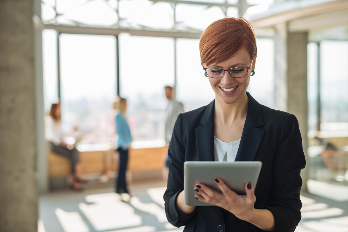 Executive improving financing from her tablet